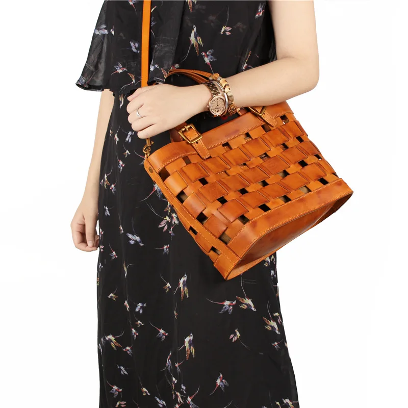 

Genuine leather handmade woven zipper handbag with strap for women