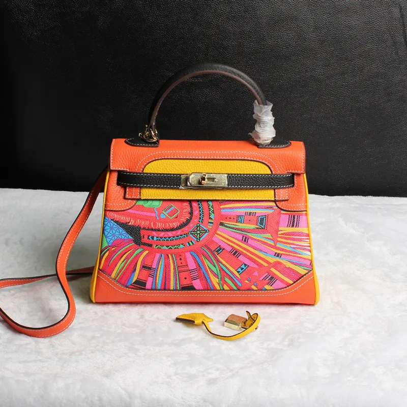 

kay Graffiti Painted Baotou Layer Cowhide Contrast Color Matching Genuine Leather Woman Package Hand Bill Of