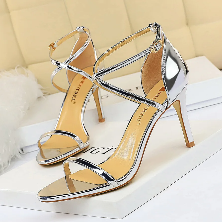 

European and American style sexy nightclub open toe metallic cross strap stiletto sandals women