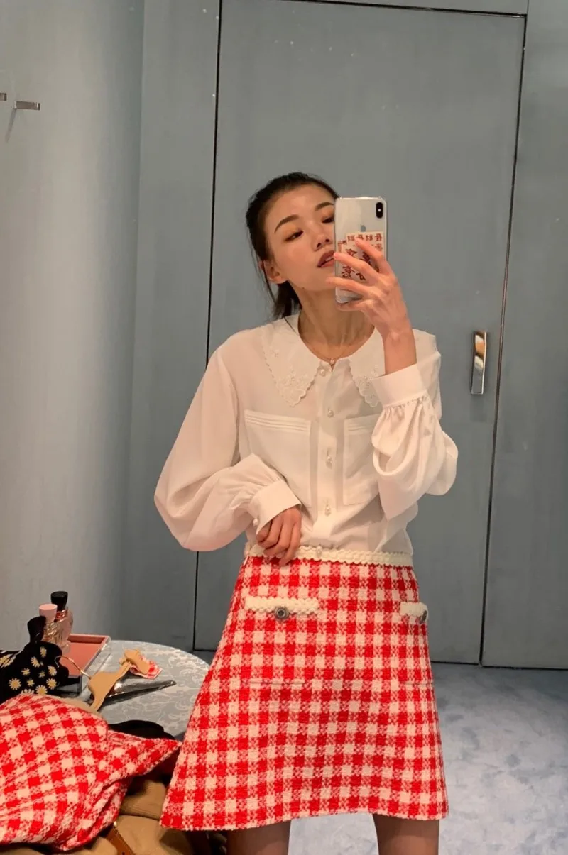 red mini skirt white blouse