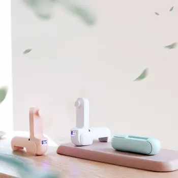

Hand-held folding fan creative mobile phone holder digital display power charging triple practical fan