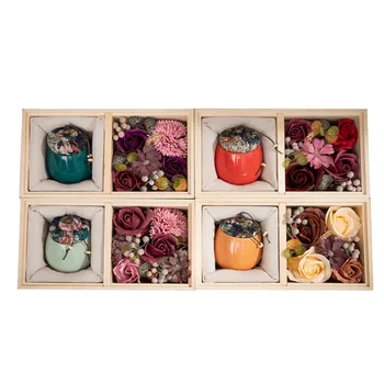 

A wooden box of scented soap and scented candles Romantic and creative birthday gift Simulated rose bouquet