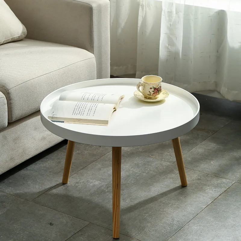 

Simple side table simple Japanese solid wood round table small type Nordic tea table ins wind head table table sofa edge a few