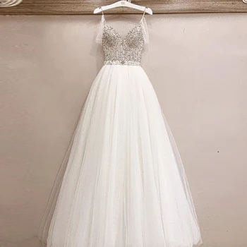 

Luxury Hand Beading Crystal Bling Illusion Bodice A Line Sequin Skirt Floor Length Wedding Dresses 2020
