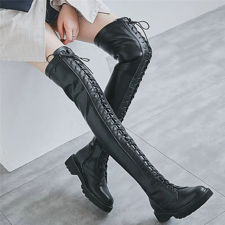 thigh high strappy boots