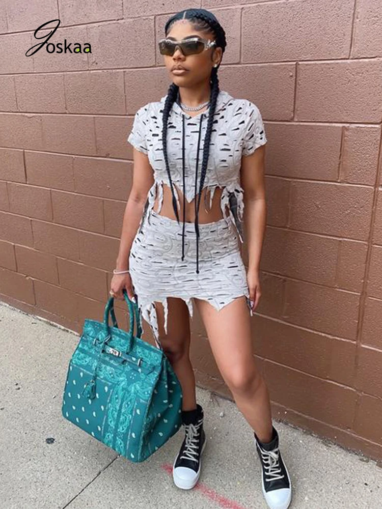 

Joskaa 2020 New Women Two Piece Sets Hole Hollow Out Beggar Short Sleeve Hooded Distressed Crop Top Solid Mini Skirt Sexy Street