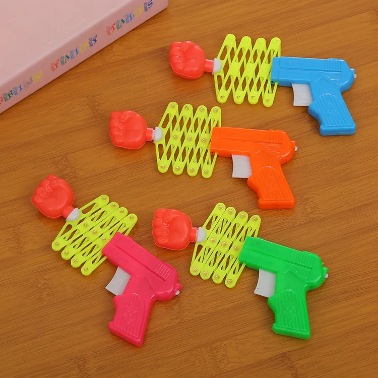 

Retractable Fist Shooter Trick Toy Gun Funny Child Kids Plastic Party Festival Gift Just For Fun Classic Elastic Telescopic Fist