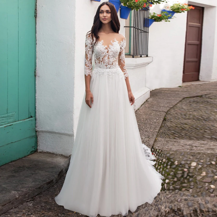 tulle wedding dress with lace illusion neckline