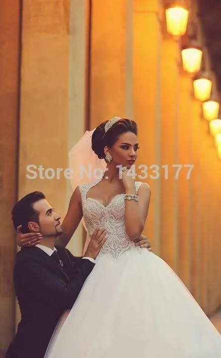 

2018 Sweetheart Saudi Arabic Backless Winter Wedding Dress Appliques Beaded Bodice Sheer Ball Gown Tulle Bridal Gowns Vestidos