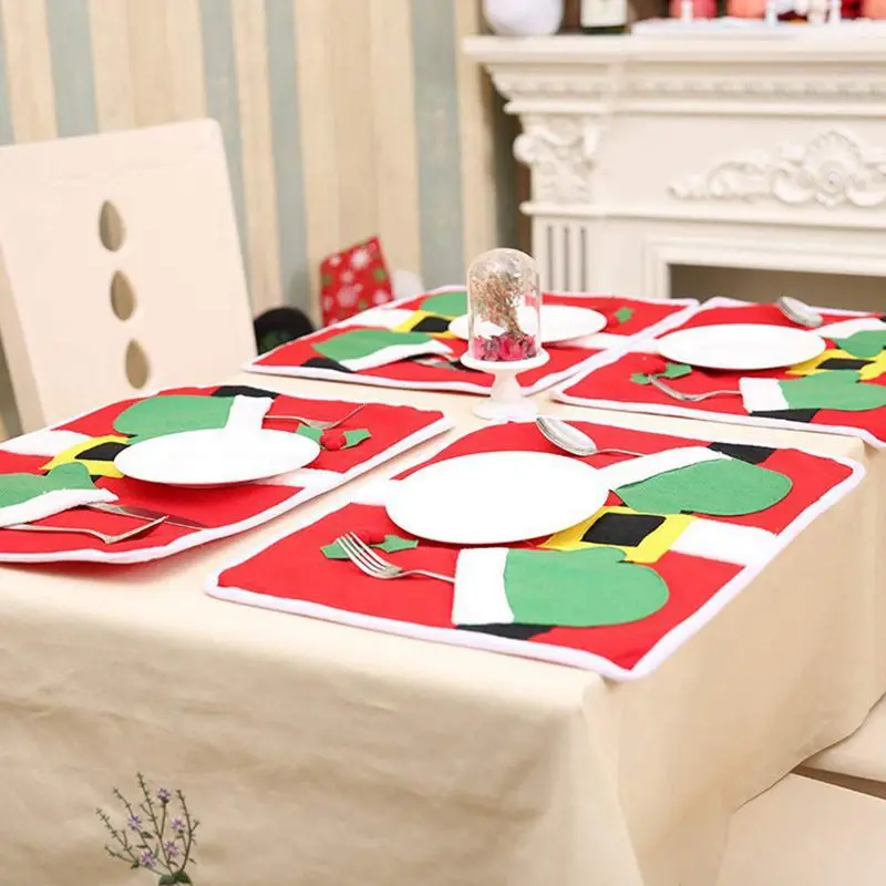 AFBC Placemats Christmas Santa Suit Table Mats, Placemat Set of 4 Non-Slip Washable Place Mats Cutlery Holder Dinner Party Decor