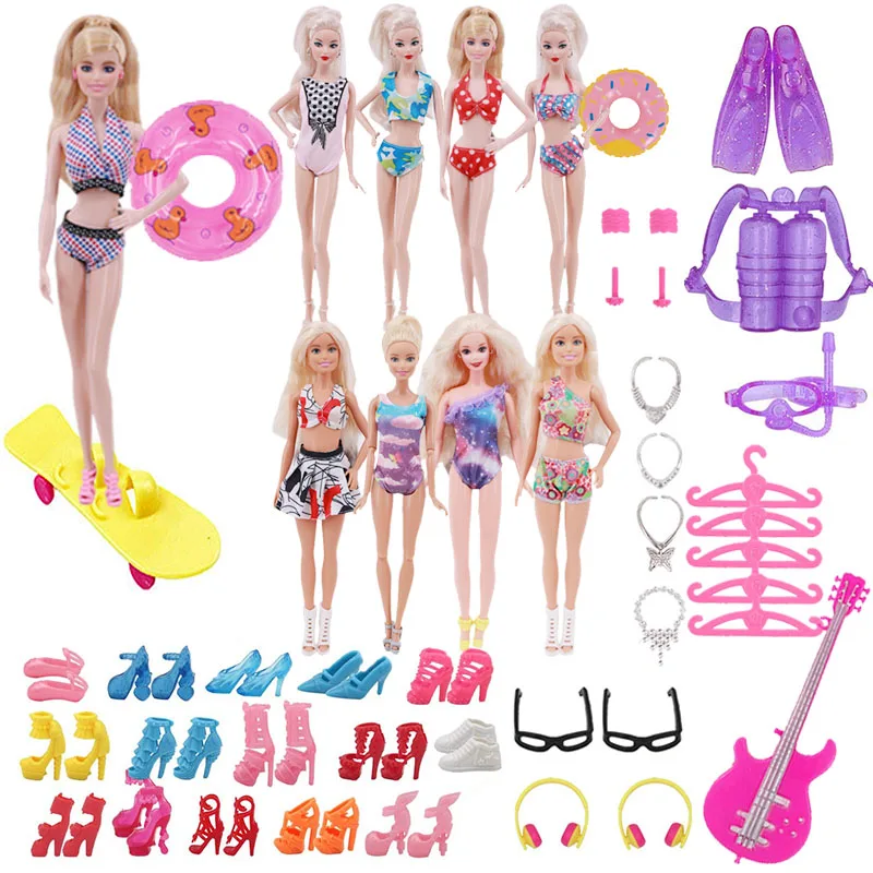 

Barbies Suit=5High Heels+4Necklaces+2Earphones+2Glasses+5Swimsuits+Skateboard+Guitar+2 Earrings+2 Bracelets+2Lifebuoys+1Wetsuit
