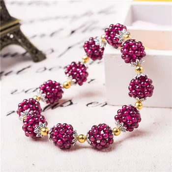 

Natural Garnet Bracelet Woman Beautifying Alcohol Red Natural Crystal Ball-flower Hand String TaoBao