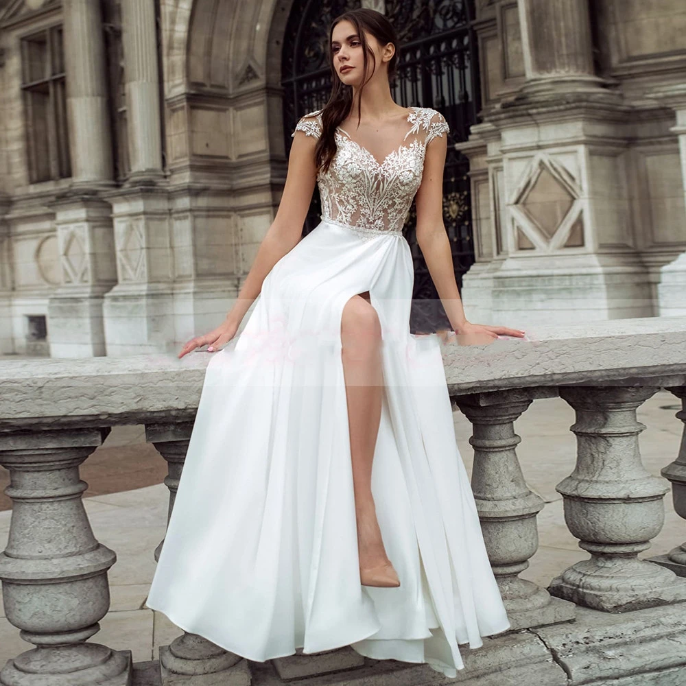 

Charming Boho Lace Wedding Dresses Side Slit Cap Sleeves Gowns V Neckline Bridal Buttons Back On Sale 2021