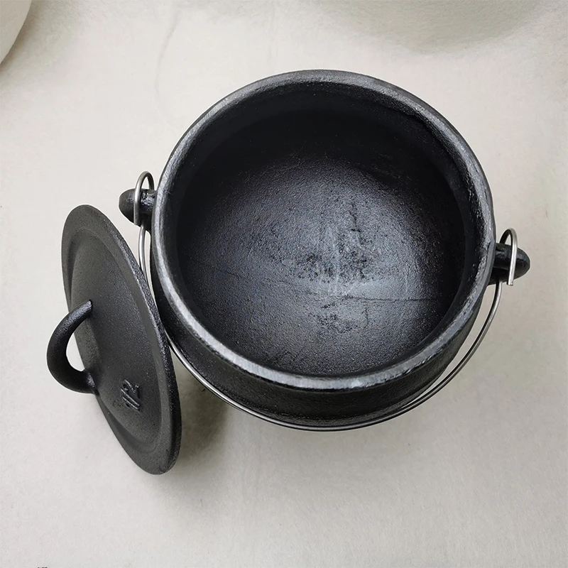 https://ae01.alicdn.com/kf/He1591aeac49f42e18e6f714fc98730e29/1-2-Cast-Iron-Potjie-1-2L-Three-Legged-South-Africa-Pot-Cookware.jpg