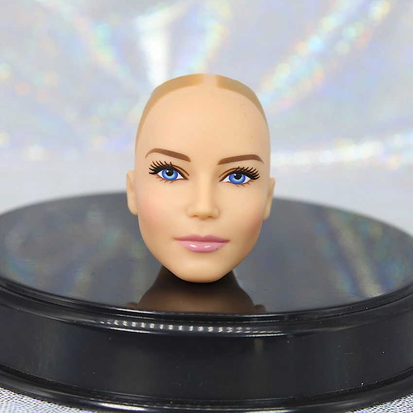 black makeup doll head