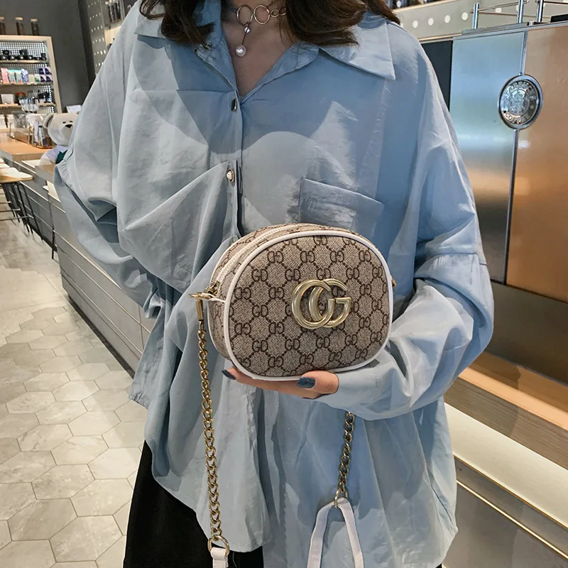 

Small round Bag 2019 New Style Fashion Printed Webbing Metal Letter Shoulder Bag Occident Fashion Ellipse Shoulder Bag