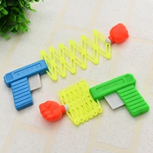 Pistolet de tir au poing rétractable, jouet amusant pour enfants, fête en plastique, cadeau de Festival pour s'amuser, jouet de poing télescopique élastique classique