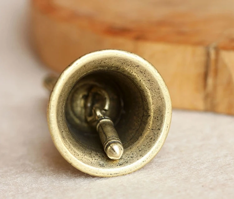 Brass Handicraft die-casting Drop Magic Bell Key Car Button Wind Bell Tibetan Bronze Bell Creative Gift home Decoration Pendant Brass Handicraft die-casting Drop Magic Bell Key Car Button Wind Bell Tibetan Bronze Bell Creative Gift home Decoration Pendant