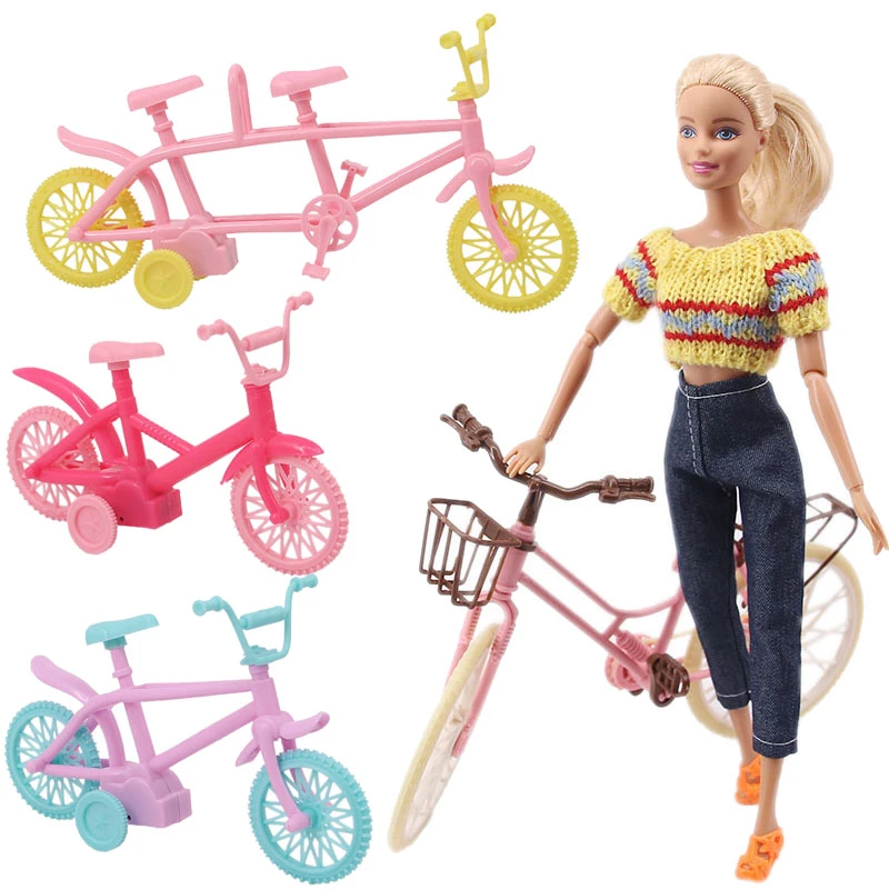 muñeca barbie con bicicleta