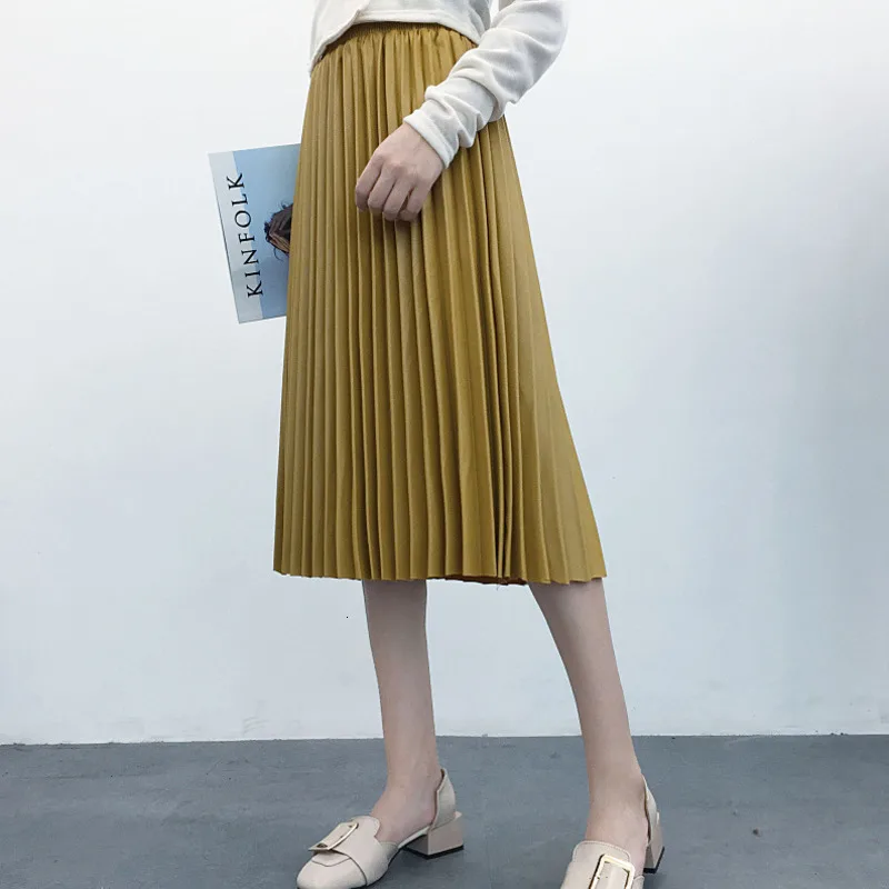 TVVOVVIN Осенняя мода новая плиссированная юбка из искусственной кожи эластичная высокая талия Универсальная Женская юбка свободного покроя X666
