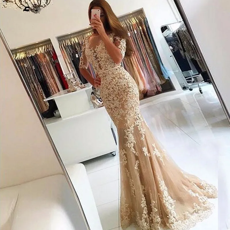 

Champagne Long Mermaid Prom Dresses 2019 Lace Applique Half Sleeves Backless Formal Evening Gowns Sheer Scoop Lace Party Gown