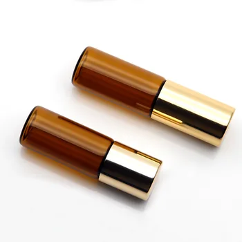 

Sedorate 400 pcs 1ml amber glass bottle golden lid black coaster steel roller bottle