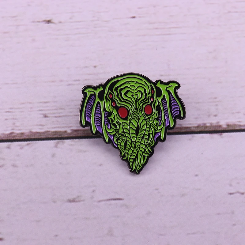 

Cthulhu enamel pin probes the universe brooch