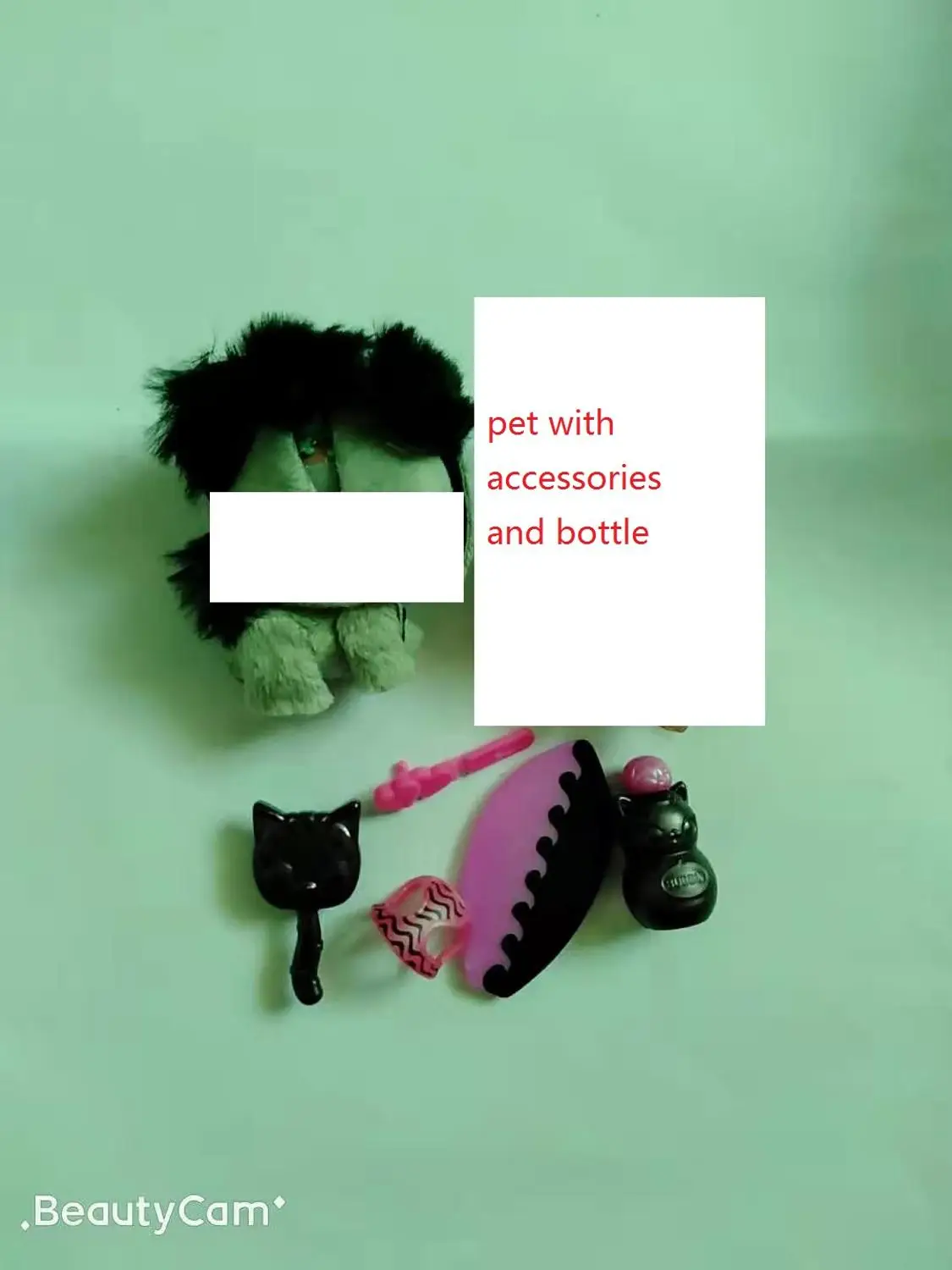 

small pet with accessories and bottle plastic toy same as picture