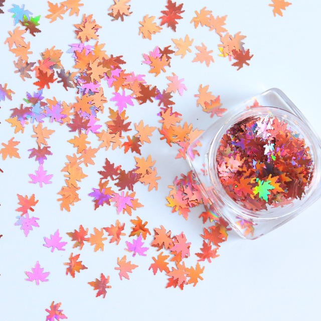 box with 12 styles of color laser maple leaf nail sequins Holographic Metallic Leaf Glitter Sequin Nail Art Patch Decoration