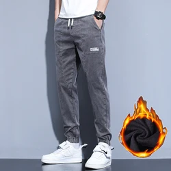 Pantalones vaqueros térmicos para hombre, Jeans gruesos y cálidos de talla grande, color negro y gris, ropa de calle de invierno, 2021