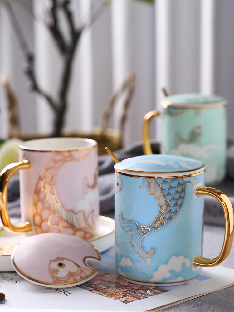 https://ae01.alicdn.com/kf/He23ac255c35f4ca89d9a7c25a5687d42J/Ceramic-Mug-With-Lid-Spoon-Fish-Tail-Couple-Drinking-Water-Cups-Tazas-De-Cafe-Creative-Coffee.jpg