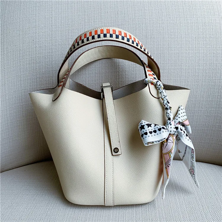 

New Basket Bag Cowhide Bucket Bag Palm-printed Woven Wide Shoulder Strap One-shoulder Hand-held Leather Women's Bag