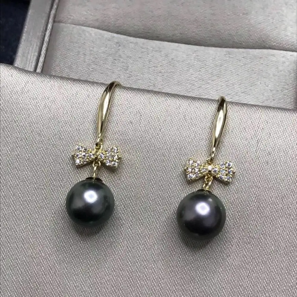 

gorgeous a pair of 10-11mm tahitian round black green pearl earring 18k