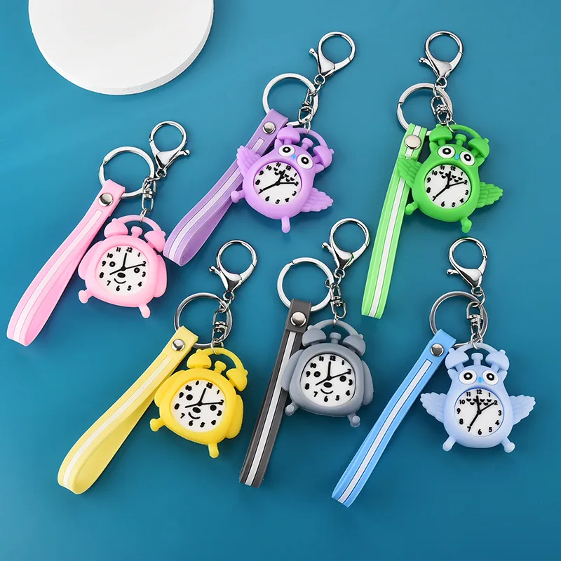 

New soft rubber owl alarm clock keychain pendant alarm clock student bag pendant cartoon PVC pendant
