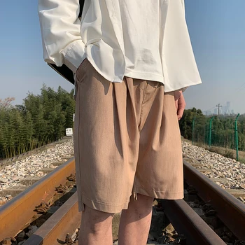 

2020 Summer New Men's Youth Popular Solid Color Elastic Waist Shorts Fashion Casual Wild Mid-rise Five-point Pants Khaki / Black