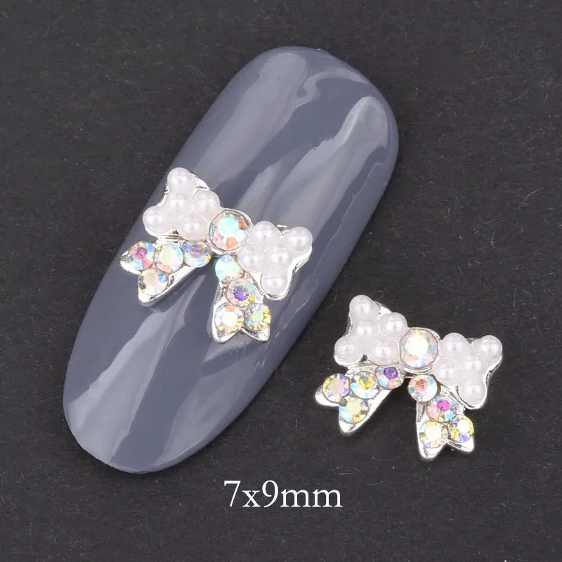 10pcs Strass 3d Nail Bow Tie AB White Rhinestone Pearl Design Nail Art Decoration Glamour Silver Alloy Jewelry Nail QB028-029