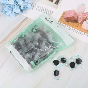 

100PCS Black Compressed Mask Disposable Facial Natural Bamboo Charcoal Black Mask Paper Skin Care Wrapped Masks DIY Makeup