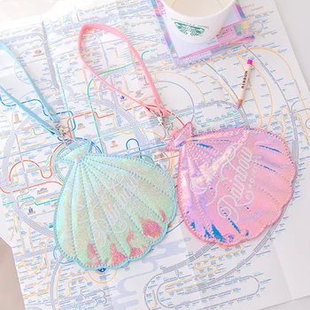 

High-grade luggage tag made of shell-shaped laser material Travel Accessories Travel Etiqueta QT3257