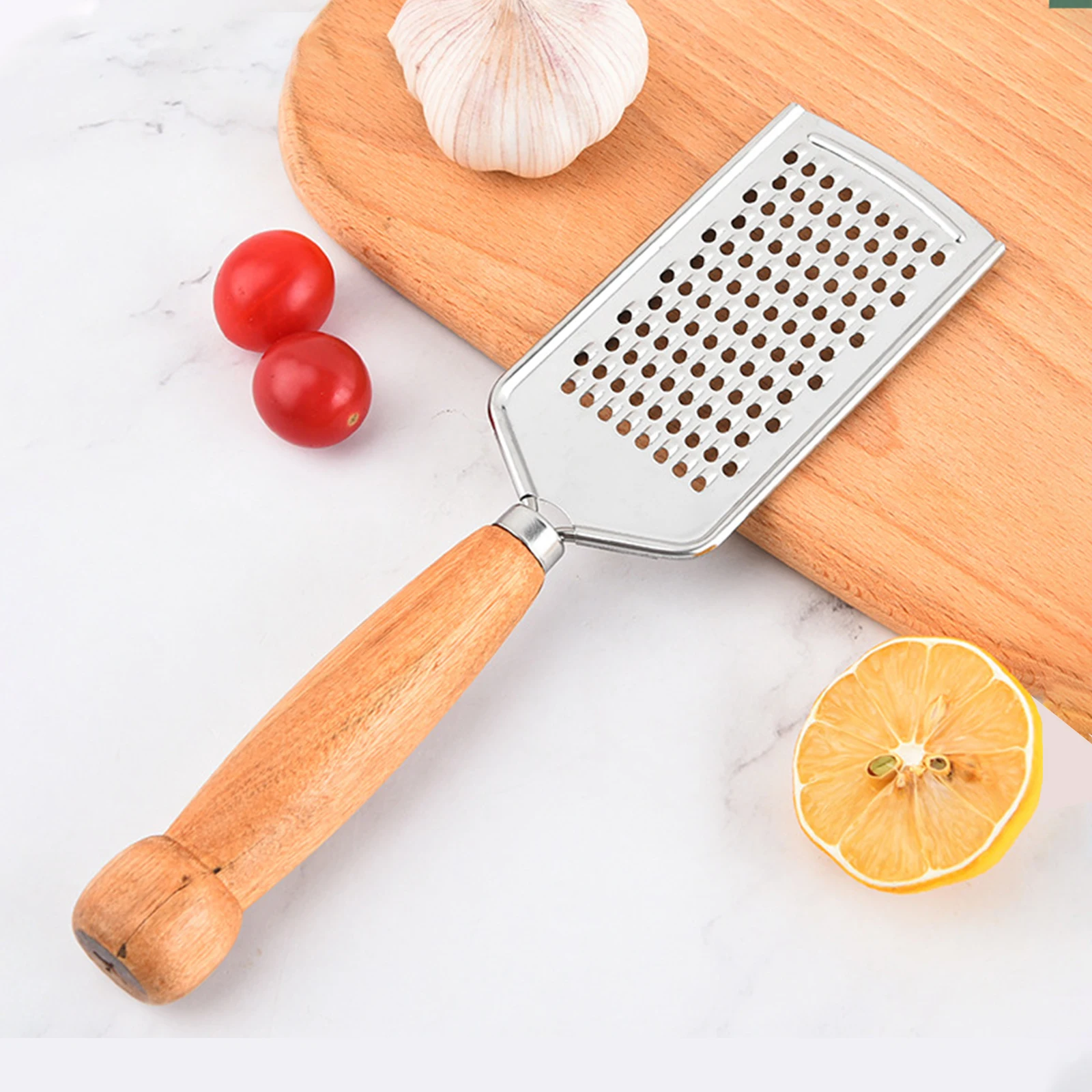 https://ae01.alicdn.com/kf/He3195cf755be48e19b5c6e4d6c97788dK/Stainless-Steel-Handheld-Cheese-Grater-Multi-Purpose-Kitchen-Food-Graters-For-Cheese-Chocolate-Butter-Fruit-Vegetable.jpg