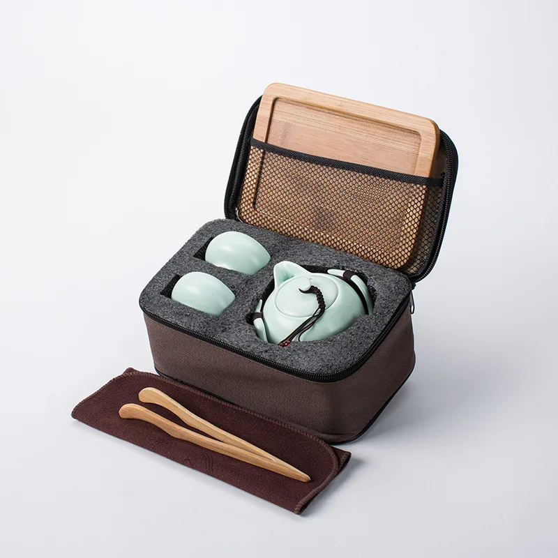 

See. Ding. Taiwan Old Rock Mud Tea Set Quik Cup a Pot Two Cup Travel Gift Kung Fu Tea Set