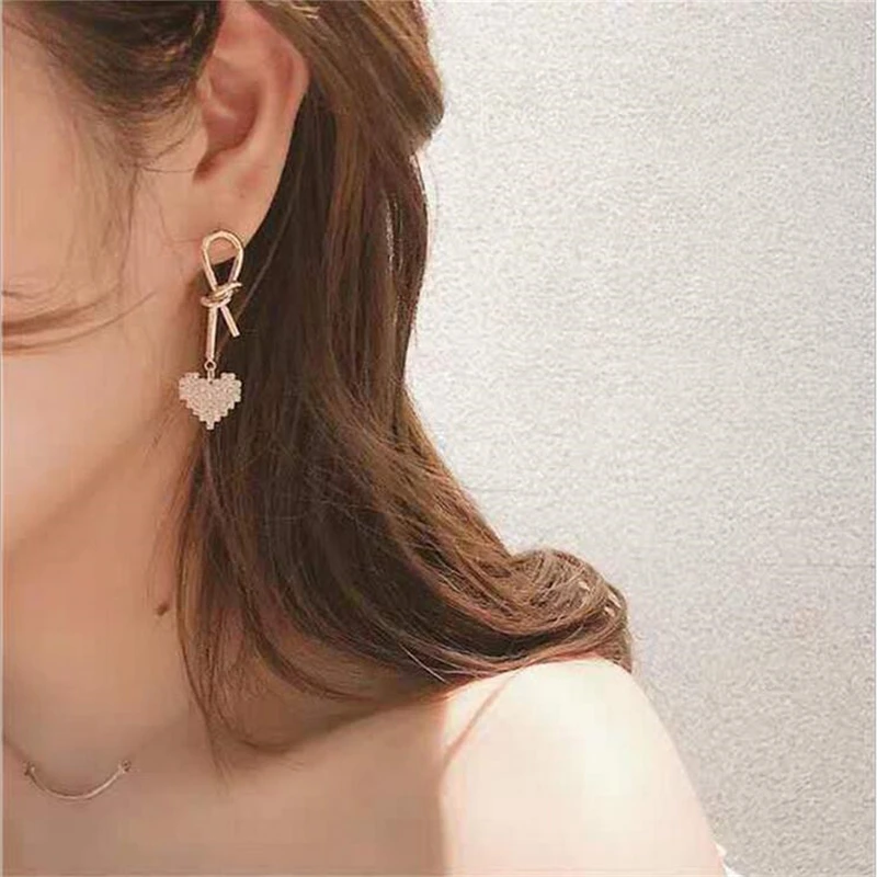 

new fashion crystal heart stud earrings for women gold color personality needle prevent allergy irregular knotbow stud earrings