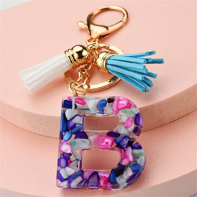 Women Keychains 26 Glitter Hollowed-out Words Handbag Tassel English Letter Keyring with Puffer Ball Charms Free Shipping