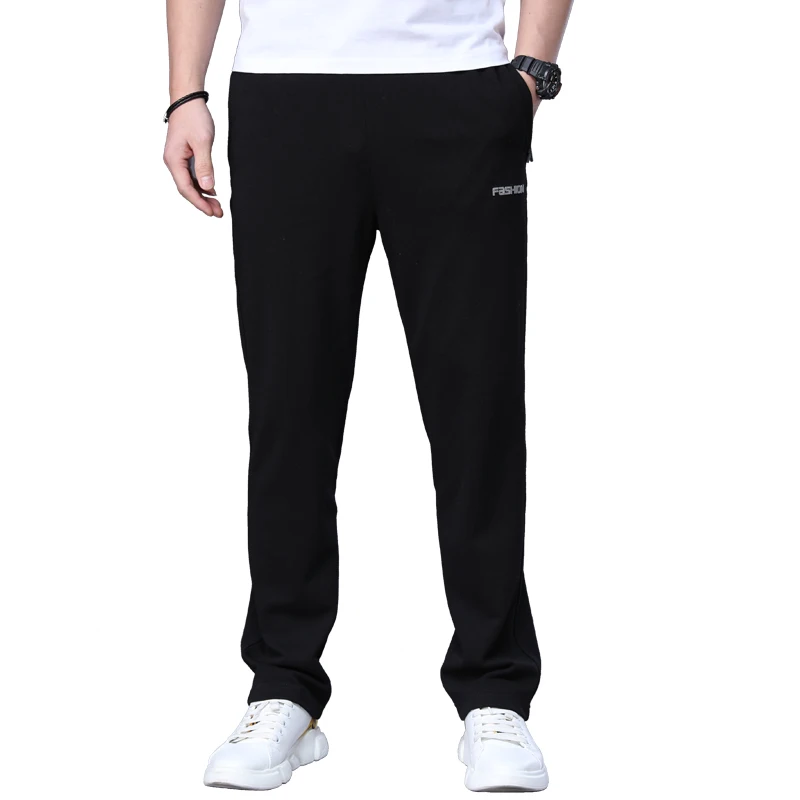 Men Sports Running Pants Zipper Pockets Loose Training Elastic Waist