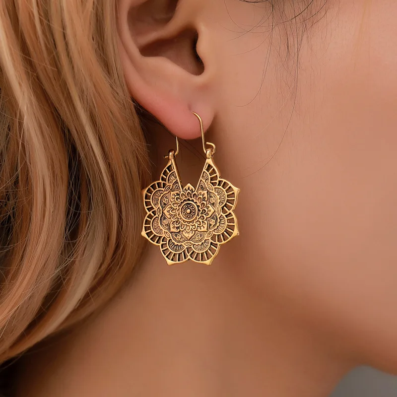 

Earrings exotic vintage metal openwork flower earrings bohemian carved palace wind earrings