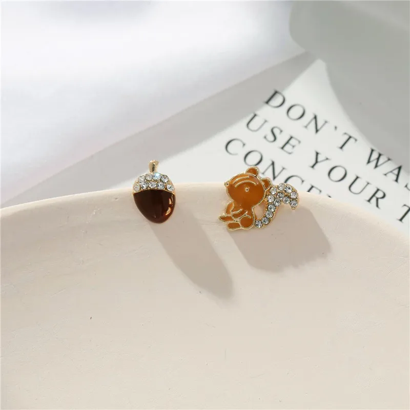 

European, American, Japanese and Korean 925 needle creative squirrel and pine cone earrings cute sweet short style earrings asym