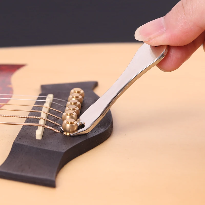 

Инструмент для струн гитары, съемник струн из нержавеющей стали для акустической гитары, съемник мостовых штифтов, удобный инструмент