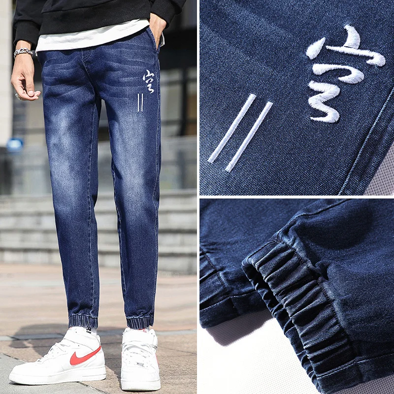 

Spring jeans men loose harlan foot han edition men's casual pants tide elastic beam light color pants popular logo The thin pant