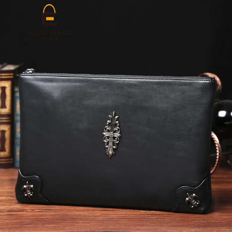 

Korean men's hand bag fashion rivet wrist bag men's and women's casual shoulder diagonal iPad bag