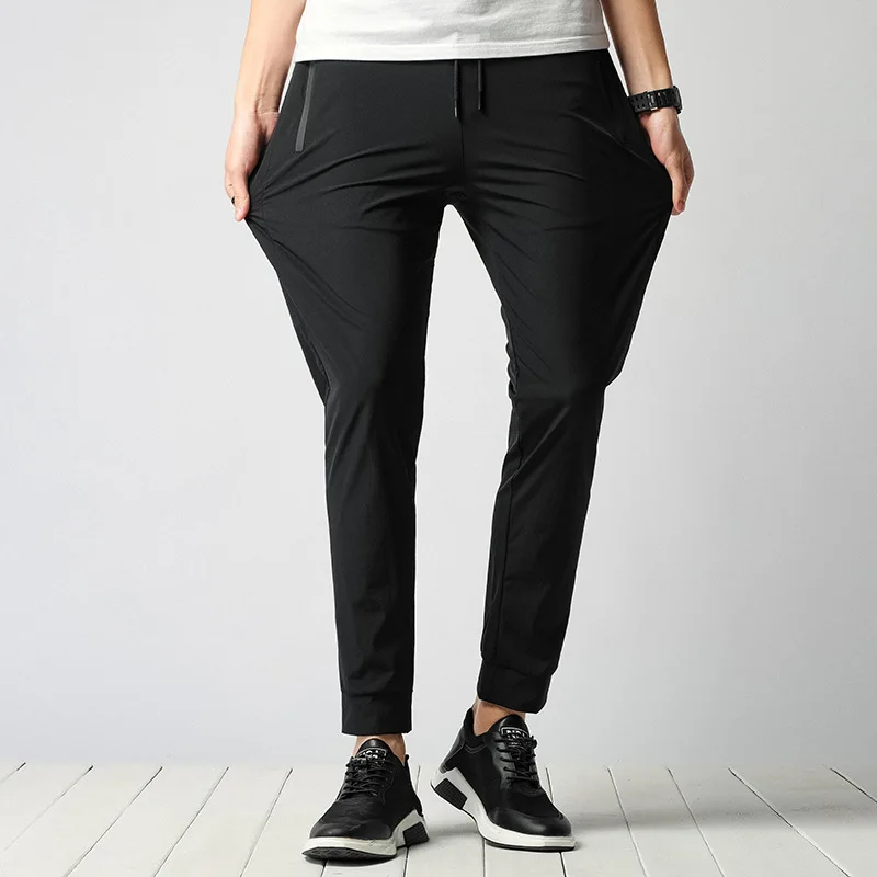 Spring And Summer Thin Outdoor Casual Versatile Sports Mountain Climbing Trousers Men's Closing Beam Leg Elasticity Plus-sized Q