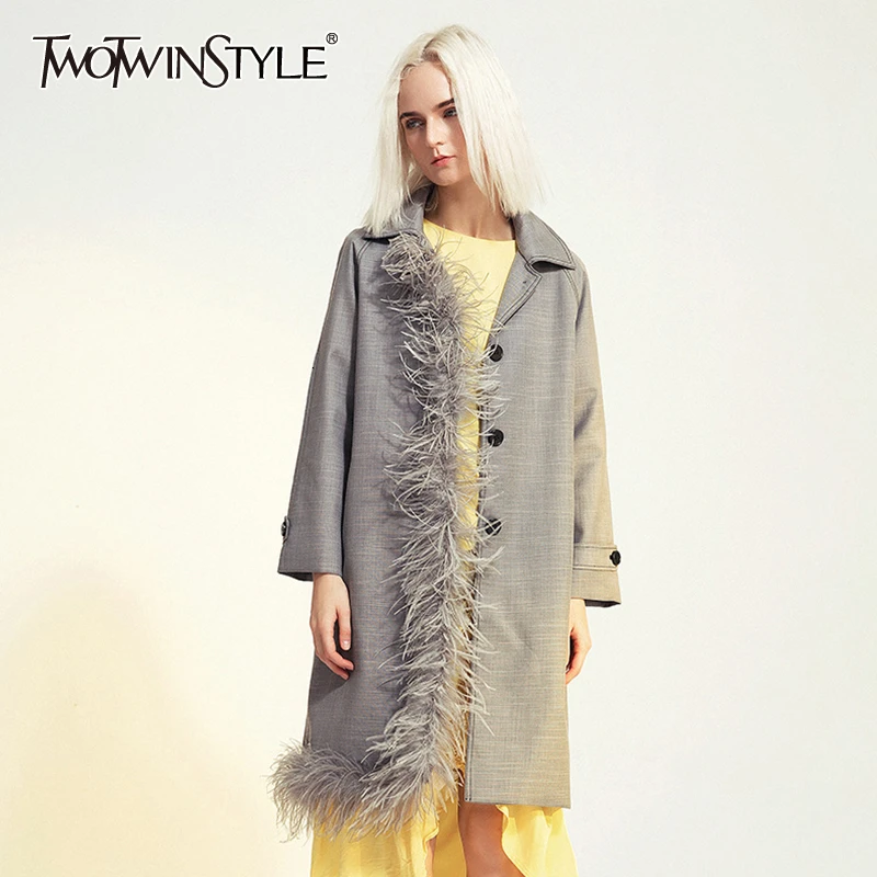 

TWOTWINSTYLE Women Feather Spliced Asymmetric Trench New Lapel Long Sleeve Loose Fit Windbreaker Fashion Tide Autumn Winter 2019